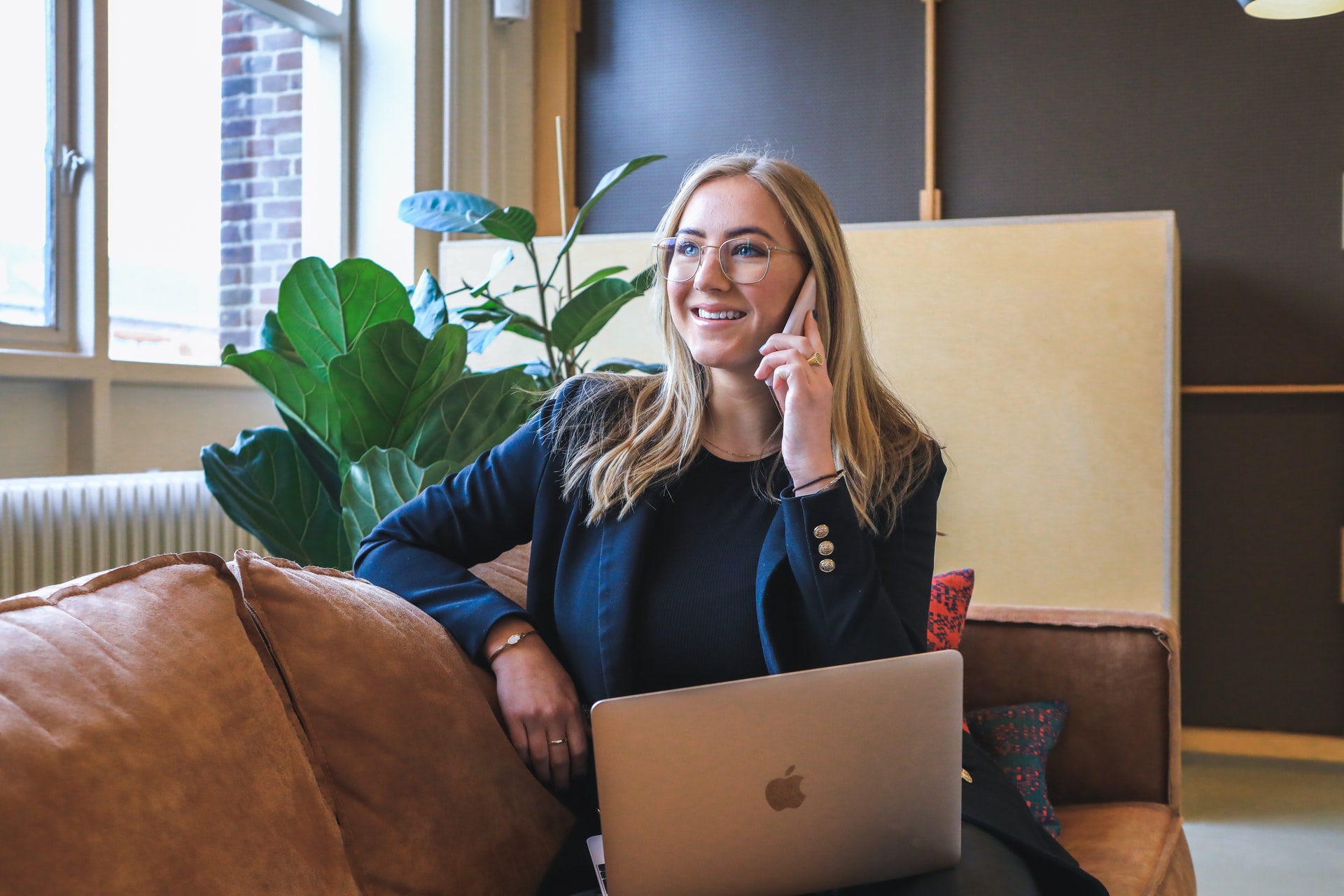 Woman using phone chatting about SEO for Small Business